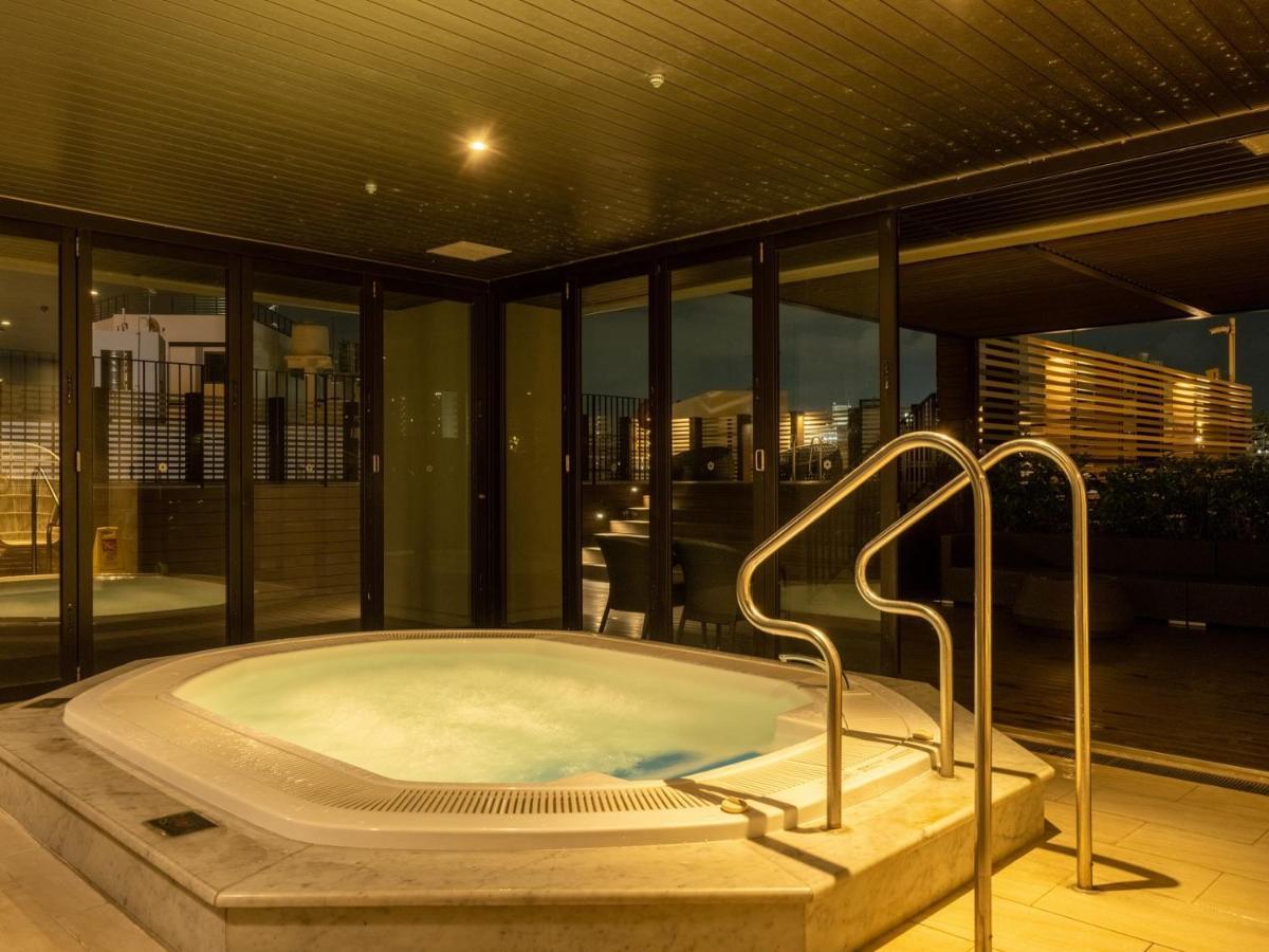 Hyatt Regency Naha, Okinawa Hotel Exterior foto A modern onsen in Tokyo